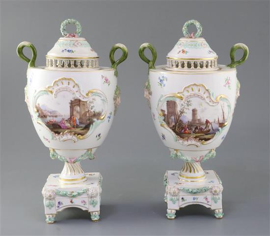 A pair of Meissen pot pourri vases and covers, late 19th century, height 32cm, some restoration